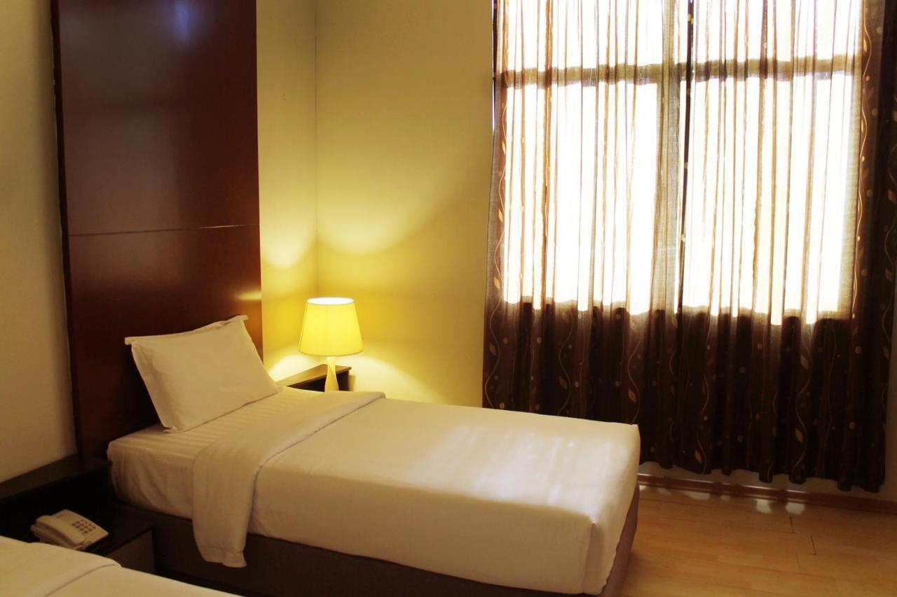 Ginasuite Kompleks27 Hotel Bandar Seri Begawan Rum bild